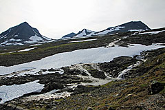 Fluss vom Tjäktjatjåkkaglaciären